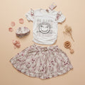 Girls Be Kind Smiley Tee & Floral Skirt Set with Cap